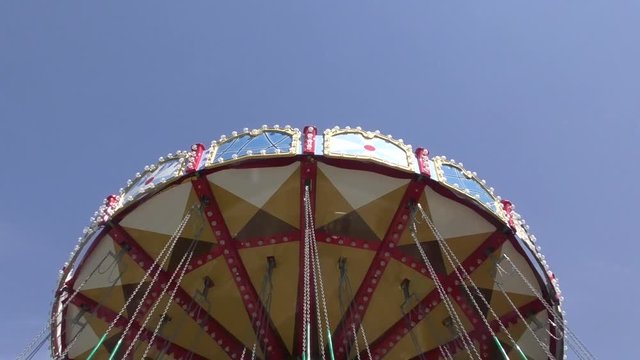 Carousel for children in the summer Park.
