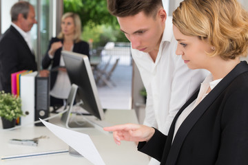 Group of happy business people in a meeting at office