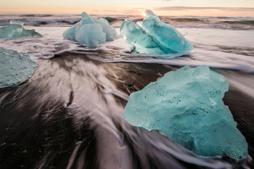 Icebergs on the black sand volcanic beach,  Vatnajokull Glacier, Iceland.