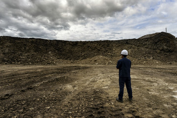 The worker man at mine on beautifu sky