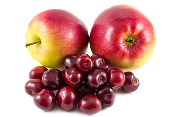 Red fresh cherries and apples