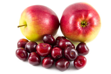Red fresh cherries and apples