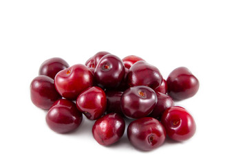 Red fresh cherries on white