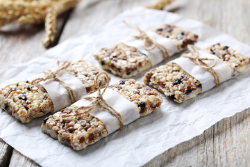 Granola bar on a grey wooden table