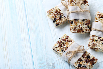 Granola bar on a blue wooden table