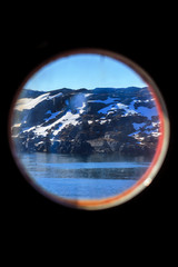 View from the window of a boat on the mountains and the sea