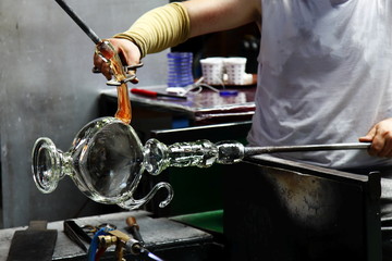 Production of glass- hot glass forming