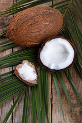 Coconut on wooden table.