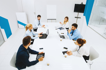 Young business people having a meeting in a conference room