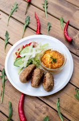 Meat patties with salad for breakfast top view