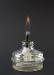 Laboratory spirit lamp filled with alcohol burns.