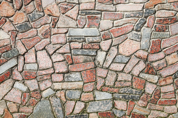 Wall lined with stone