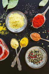 spices selection in a dark table