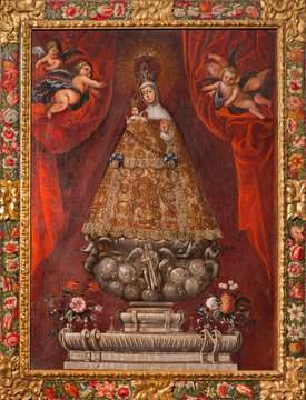 SEGOVIA, SPAIN, APRIL - 14, 2016: The painting of traditional vested Madonna in Cathedral Nuestra Senora de la Asuncion y de San Frutos de Segovia by Alonso de Herrera (1600).