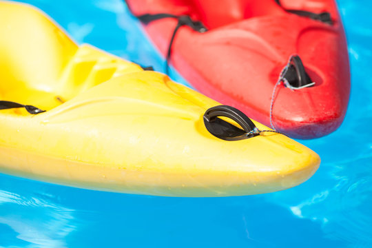 Kayaks in water close up. Court shoes in the pool. Kayaks in the