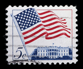 United States used postage stamp showing waving USA flag