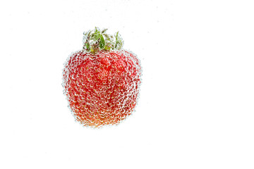 Strawberry in bubbles isolated