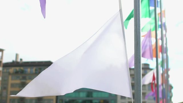 City street decorated with colorful banners, festive atmosphere on holiday