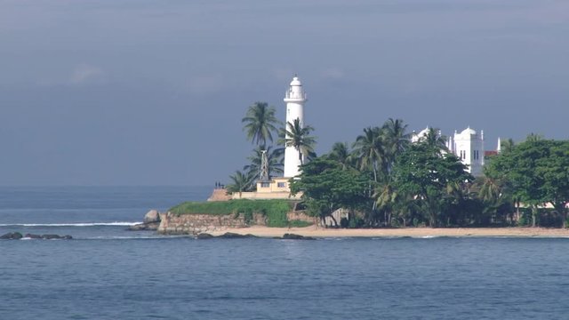 View to the lighthouse at the seaside in Galle, Sri Lanka.
