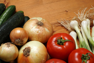 Vegetables in a basket on a stone base