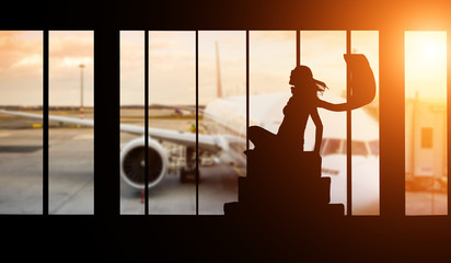 Woman silhouette at Airport - Concept of travel