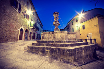 Piazza del Grano with beautiful fountain, Asciano, Tuscany, Italy - obrazy, fototapety, plakaty