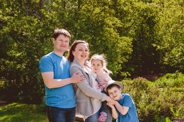Fototapeta premium Happy Family Outdoors Mother Father Son Daughter
