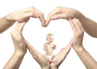 Adorable baby sitting in heart-shaped hands isolated on white