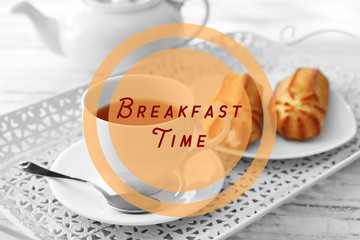 Text Breakfast Time and tea with pastries filled with custard on the tray