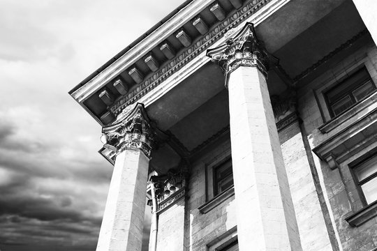 Courthouse facade with columns. Vintage style filter