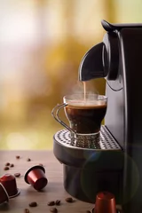 Zelfklevend Fotobehang Espresso machine making coffee on wood table vertical compositio © Davizro Photography