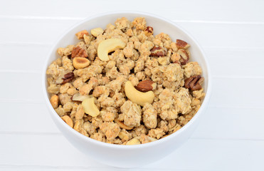 Muesli in white bowl