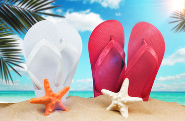 Fototapeta na wymiar Summer background with starfish and accessories on sand beach