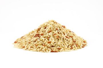 Pile of raw brown rice on white background