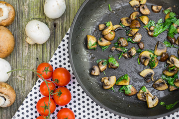 Top View on a Sautéed Brown and White Champignon Mushrooms with