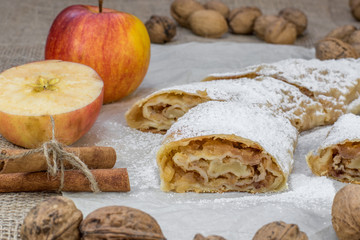 Detail on a One Slice Sugared Homemade Apple Strudel on a Baking