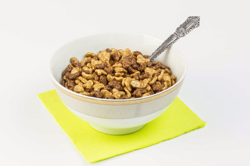 Cereal with milk and chocolate on white background