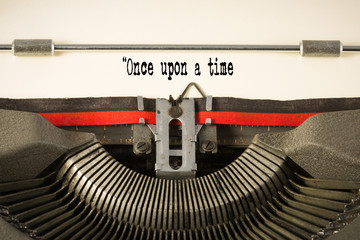 'once upon a time' phase on paper in vintage typewriter