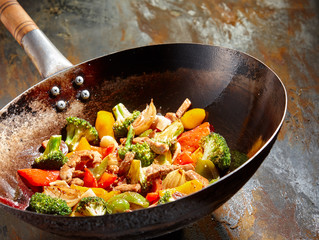 Tasty vegetable dish with broccoli and peppers - obrazy, fototapety, plakaty