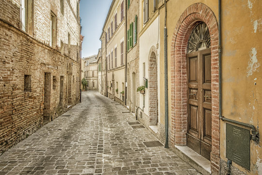 Fototapeta typical italian city street