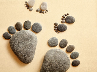 Fototapeta na wymiar Various stones in the shape of human feet