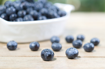 Fresh blueberries on the wooden table