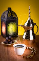 Fototapeta premium Arabian Coffee with dates and Ramadan lantern.