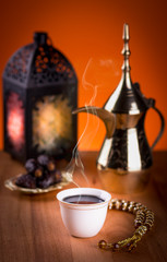 Arabian Coffee with dates and Ramadan lantern.