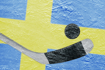 Image Swedish flag and hockey puck with the stick