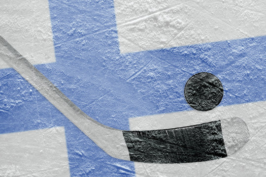 Image Finnish flag and hockey puck with the stick