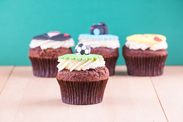 Delicious cupcakes on table