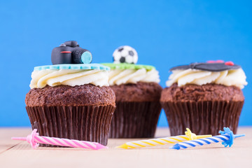 Delicious cupcakes on table
