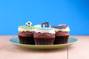 Delicious cupcakes on table