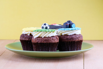 Delicious cupcakes on table